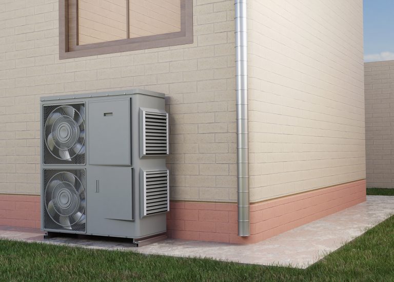 cout installation pompe a chaleur avec vue rapprochée d'une pompe à chaleur installée à l'extérieur d'une maison moderne