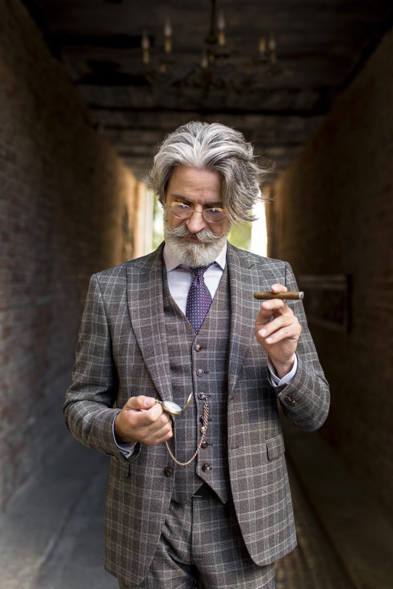 de dietrich pac portrait d'homme élégant en costume classique assis et posant