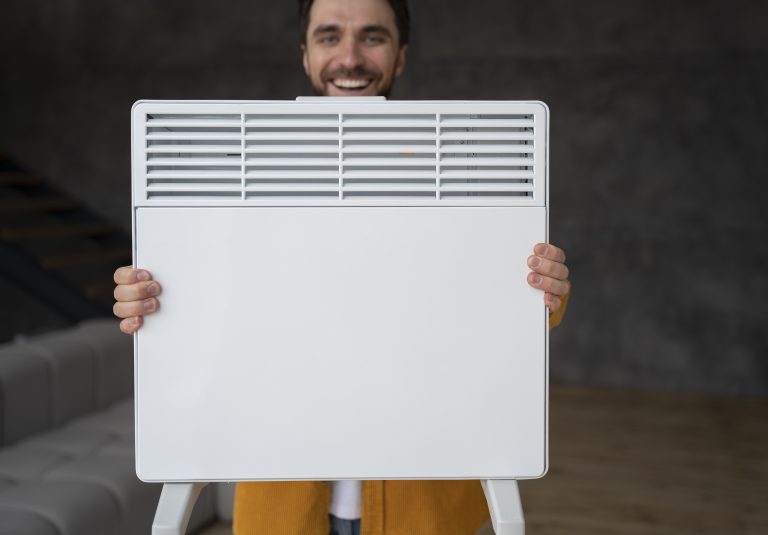 pompe a chaleur avec radiateur, personnes profitant de la chaleur d’un radiateur à la maison