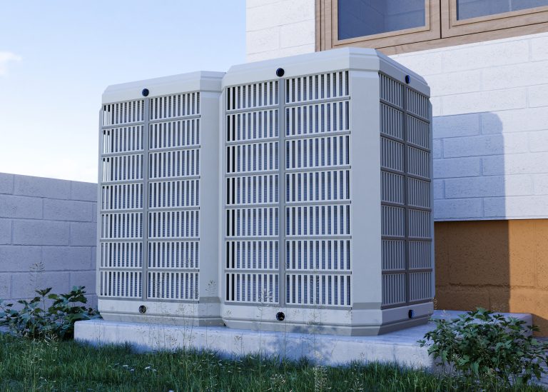 prix pompe à chaleur réversible installée à l’extérieur d’une maison moderne